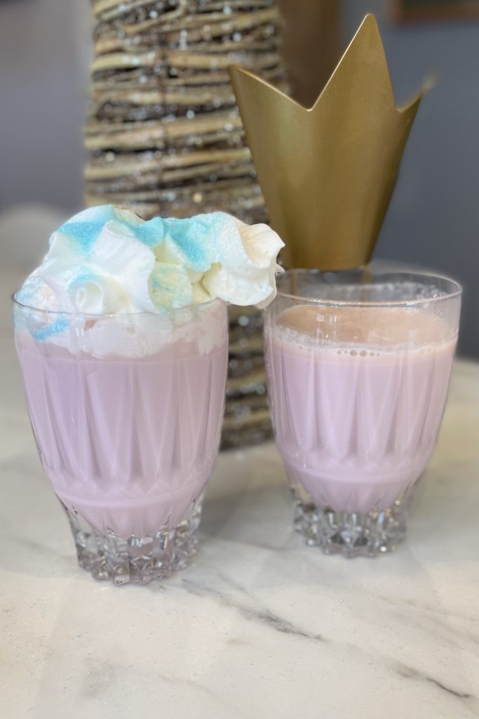 two purple hot chocolate drinks in crystal glasses